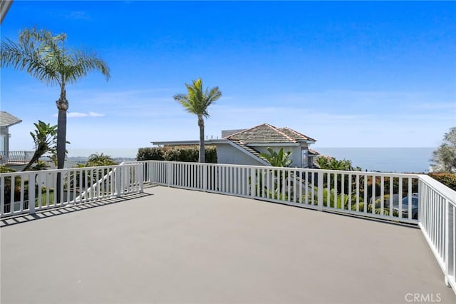 view of patio / terrace featuring a water view