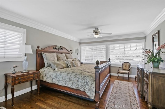bedroom featuring dark wood finished floors, ornamental molding, baseboards, and multiple windows