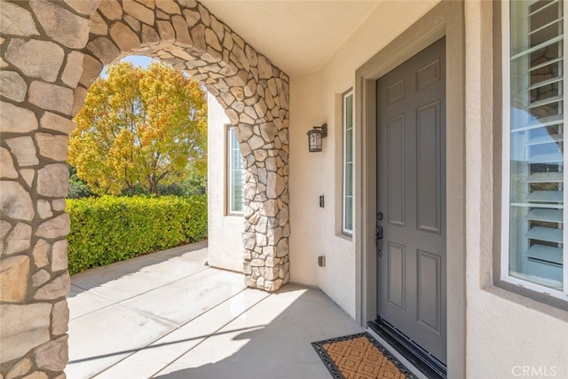 30088 Mauroux Ct, Murrieta, CA 92563 - view of exterior entry with stucco siding