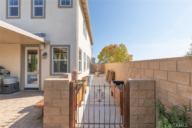 30088 Mauroux Ct, Murrieta, CA 92563 - view of gate with a patio and fence private yard