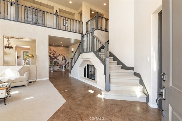 30088 Mauroux Ct, Murrieta, CA 92563 - foyer with baseboards, recessed lighting, a towering ceiling, and stairs