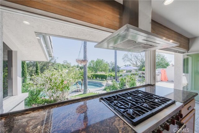 166 Alviso Dr, Camarillo, CA 93010 - kitchen with wall chimney exhaust hood and dark stone countertops