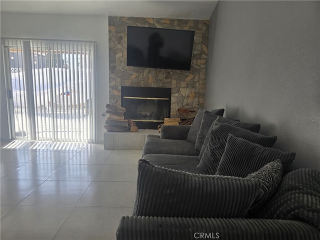 37623 Teal St, Palmdale, CA 93552 - living room featuring tile patterned flooring and a stone fireplace