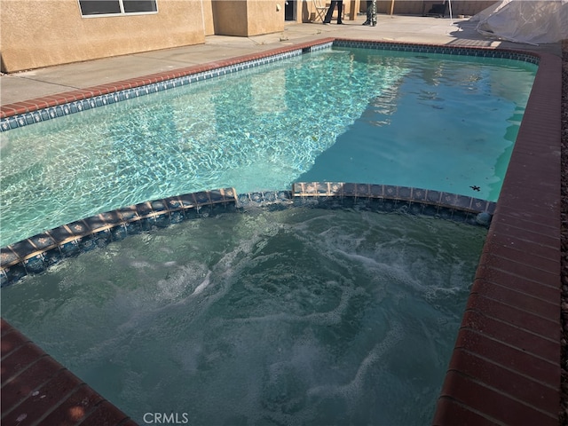 37623 Teal St, Palmdale, CA 93552 - view of swimming pool with a pool with connected hot tub