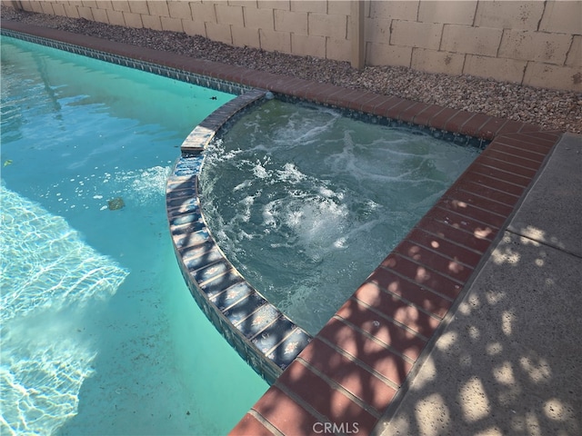 37623 Teal St, Palmdale, CA 93552 - view of swimming pool featuring a pool with connected hot tub