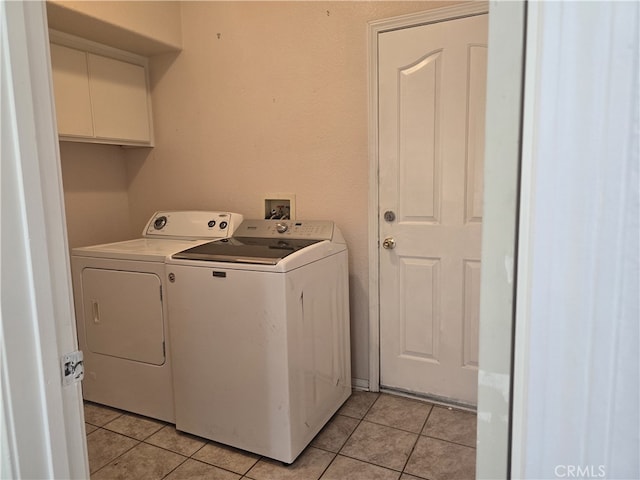 37623 Teal St, Palmdale, CA 93552 - laundry room with washer and clothes dryer, light tile patterned floors, and cabinet space