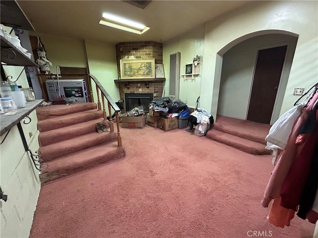 44531 Tioga St, Newberry Springs, CA 92365 - interior space featuring arched walkways, a brick fireplace, and stairway