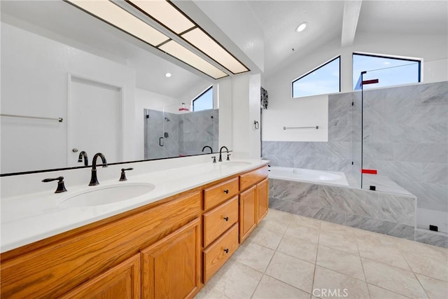 bathroom featuring a bath, lofted ceiling with beams, a sink, and a walk in shower