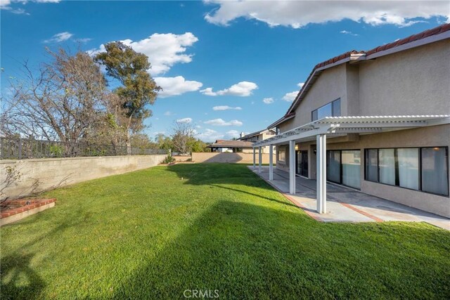 view of yard with a patio and a fenced backyard