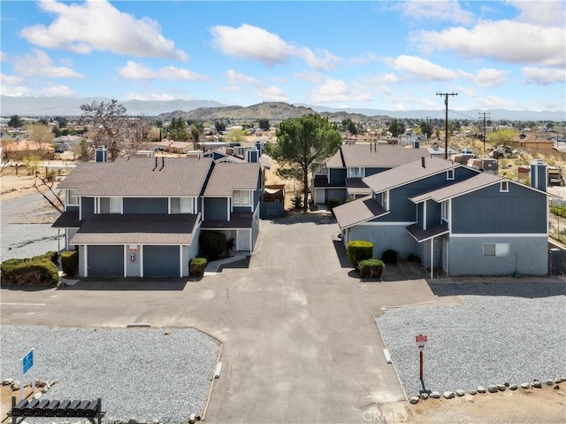 20211 Carlisle Rd, Apple Valley, CA 92307 - aerial view of residential area with a mountainous background