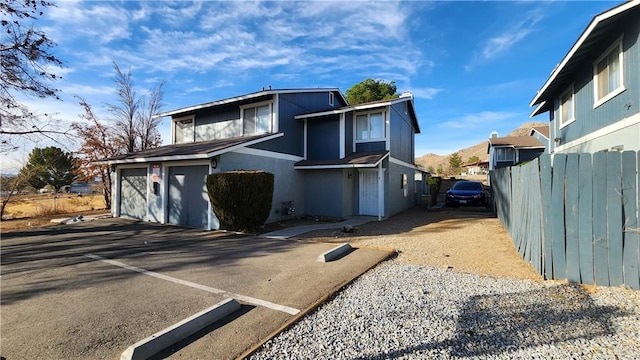 20211 Carlisle Rd, Apple Valley, CA 92307 - view of front of house featuring a garage and driveway