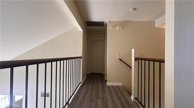 20211 Carlisle Rd, Apple Valley, CA 92307 - hallway featuring an upstairs landing, wood finished floors, lofted ceiling, and baseboards