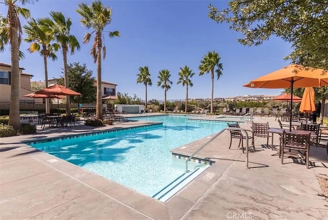 community pool with a patio