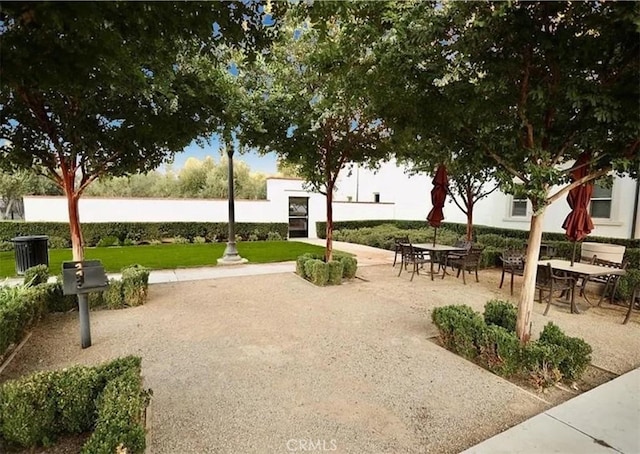 view of community with a patio area