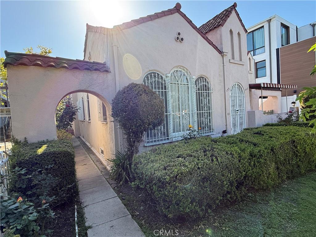 842 N Mccadden Pl, Los Angeles, CA 90038 - mediterranean / spanish house with stucco siding and a tiled roof