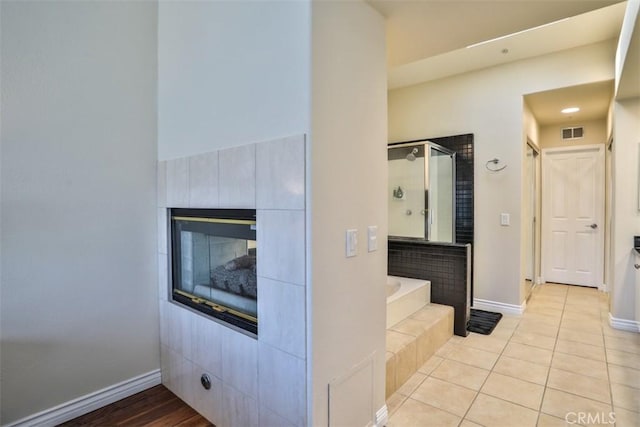 5 Arese Aisle, Irvine, CA 92606 - full bathroom with a shower stall, a bath, baseboards, and tile patterned flooring