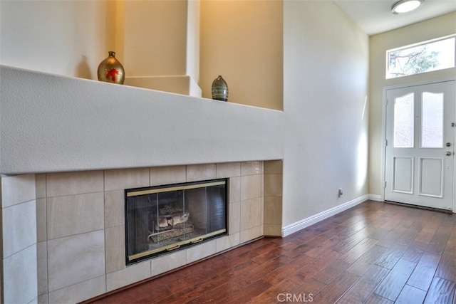 5 Arese Aisle, Irvine, CA 92606 - detailed view of wood finished floors, baseboards, and a tiled fireplace