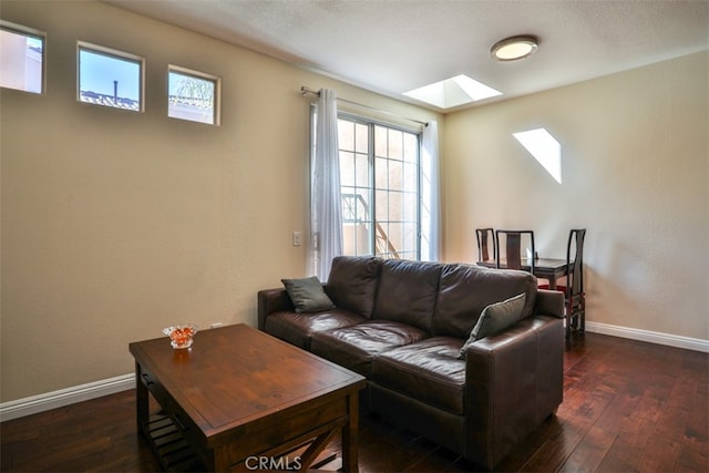 5 Arese Aisle, Irvine, CA 92606 - living room with a skylight, dark wood finished floors, and baseboards