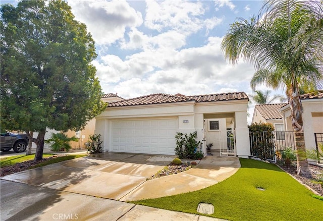 28751 Broadstone Way, Menifee, CA 92584 - mediterranean / spanish-style house featuring stucco siding, an attached garage, driveway, and a tiled roof