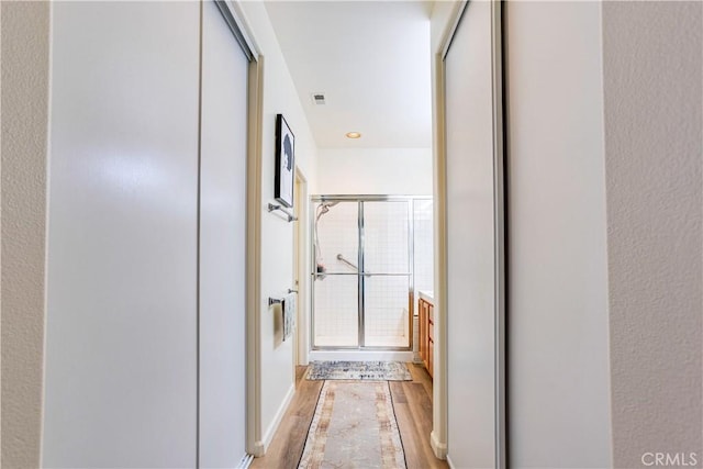 28751 Broadstone Way, Menifee, CA 92584 - corridor with light wood-style flooring