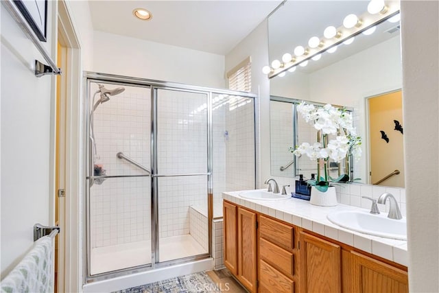 28751 Broadstone Way, Menifee, CA 92584 - bathroom featuring a shower stall, double vanity, and recessed lighting