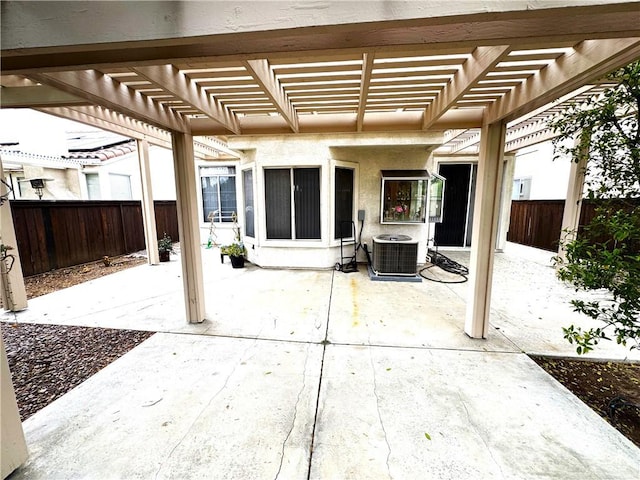 28751 Broadstone Way, Menifee, CA 92584 - fenced backyard with a patio, a pergola, and central AC unit