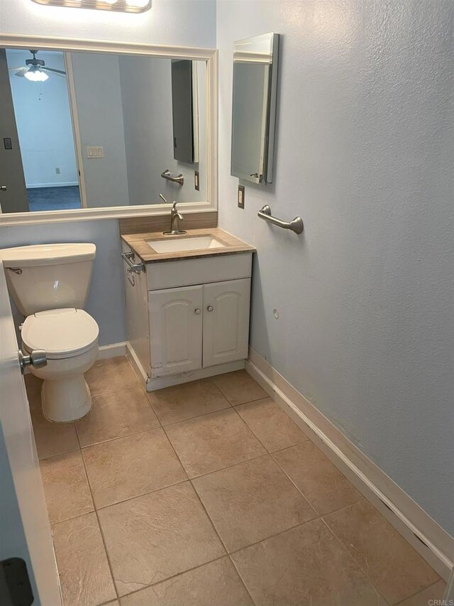 1726 Belle Meade Rd, Encinitas, CA 92024 - bathroom featuring tile patterned flooring, toilet, baseboards, vanity, and a ceiling fan