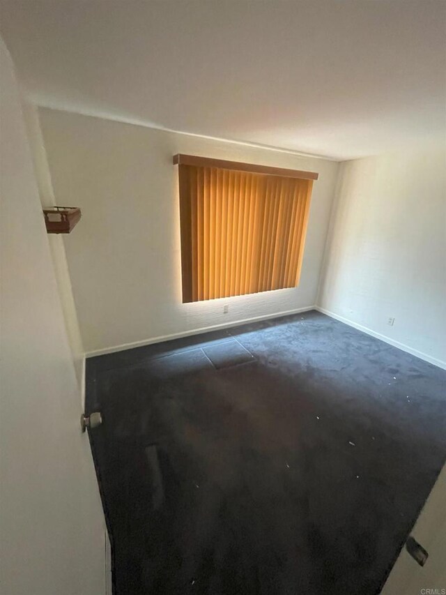 1726 Belle Meade Rd, Encinitas, CA 92024 - empty room with baseboards and dark carpet