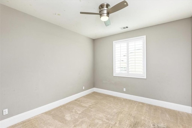 30580 Hawkscrest Rd, Murrieta, CA 92563 - carpeted empty room featuring visible vents, baseboards, and a ceiling fan