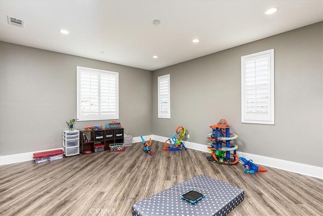 30580 Hawkscrest Rd, Murrieta, CA 92563 - playroom featuring visible vents, baseboards, recessed lighting, and wood finished floors