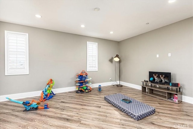 30580 Hawkscrest Rd, Murrieta, CA 92563 - exercise area with recessed lighting, baseboards, and wood finished floors
