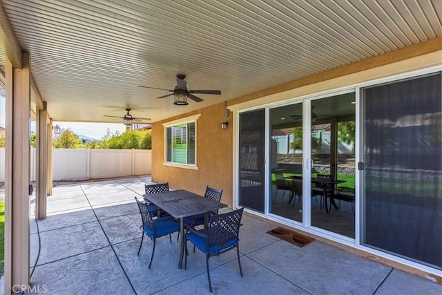 30580 Hawkscrest Rd, Murrieta, CA 92563 - view of patio featuring ceiling fan, fence, and outdoor dining area