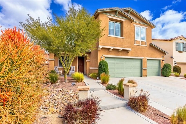30580 Hawkscrest Rd, Murrieta, CA 92563 - view of front of home with stucco siding, a garage, and concrete driveway