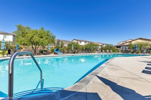 30580 Hawkscrest Rd, Murrieta, CA 92563 - community pool featuring a patio area and fence