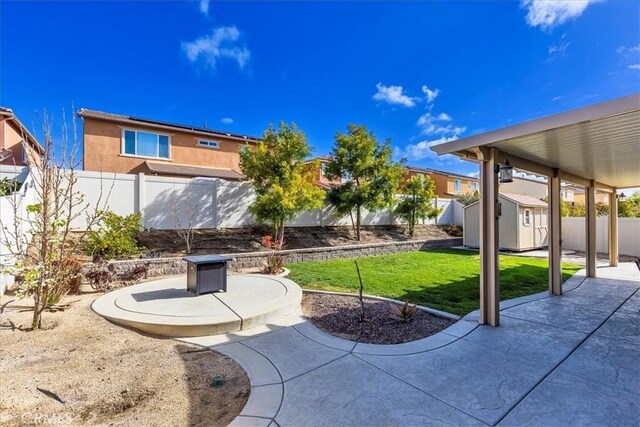30580 Hawkscrest Rd, Murrieta, CA 92563 - view of patio with a shed, a fenced backyard, and an outdoor structure