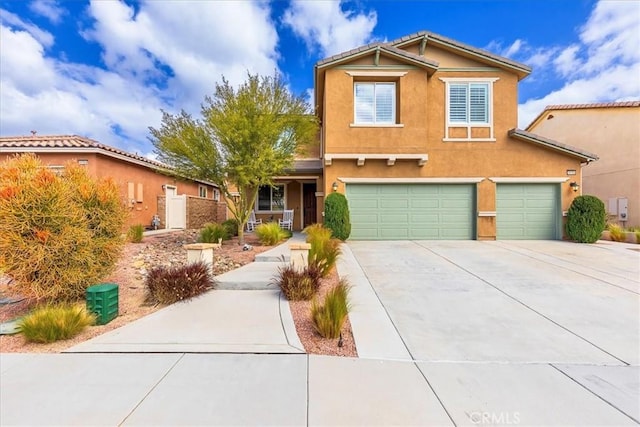 30580 Hawkscrest Rd, Murrieta, CA 92563 - traditional home with a garage, driveway, and stucco siding