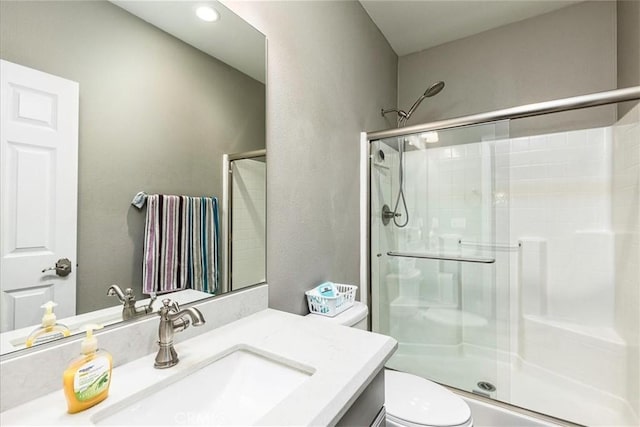 30580 Hawkscrest Rd, Murrieta, CA 92563 - bathroom featuring toilet, a stall shower, and vanity