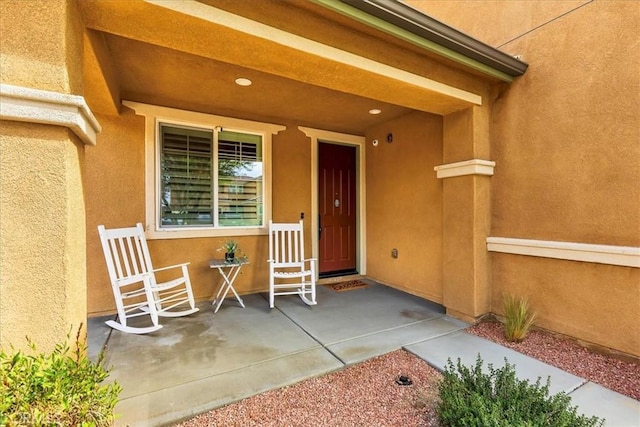 30580 Hawkscrest Rd, Murrieta, CA 92563 - doorway to property featuring a porch and stucco siding