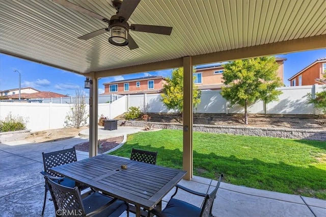 30580 Hawkscrest Rd, Murrieta, CA 92563 - view of patio with outdoor dining area, a fenced backyard, and a ceiling fan