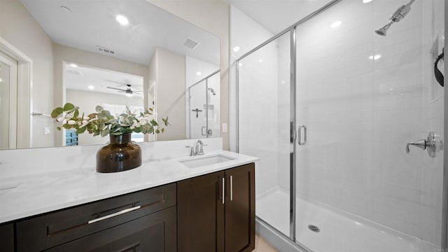 10861 Blake Way, San Diego, CA 92129 - bathroom with a shower stall, vanity, and ceiling fan