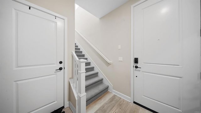 10861 Blake Way, San Diego, CA 92129 - foyer with light wood finished floors and stairway