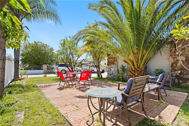 view of patio / terrace with fence