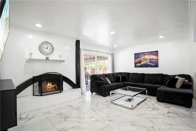 living room with marble finish floor, crown molding, a lit fireplace, and recessed lighting