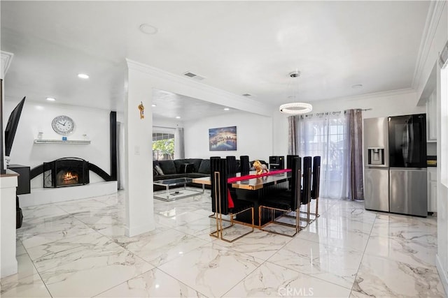 dining room with visible vents, recessed lighting, marble finish floor, ornamental molding, and a lit fireplace