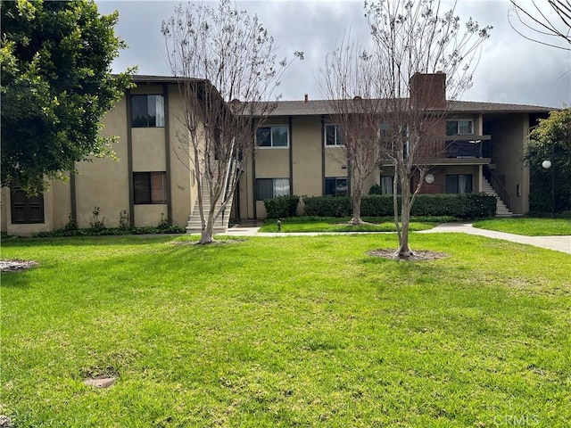 1111 S Coast Dr Unit 18, Costa Mesa, CA 92626 - view of building exterior with stairway