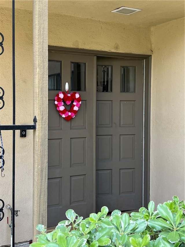 1111 S Coast Dr Unit 18, Costa Mesa, CA 92626 - property entrance with stucco siding