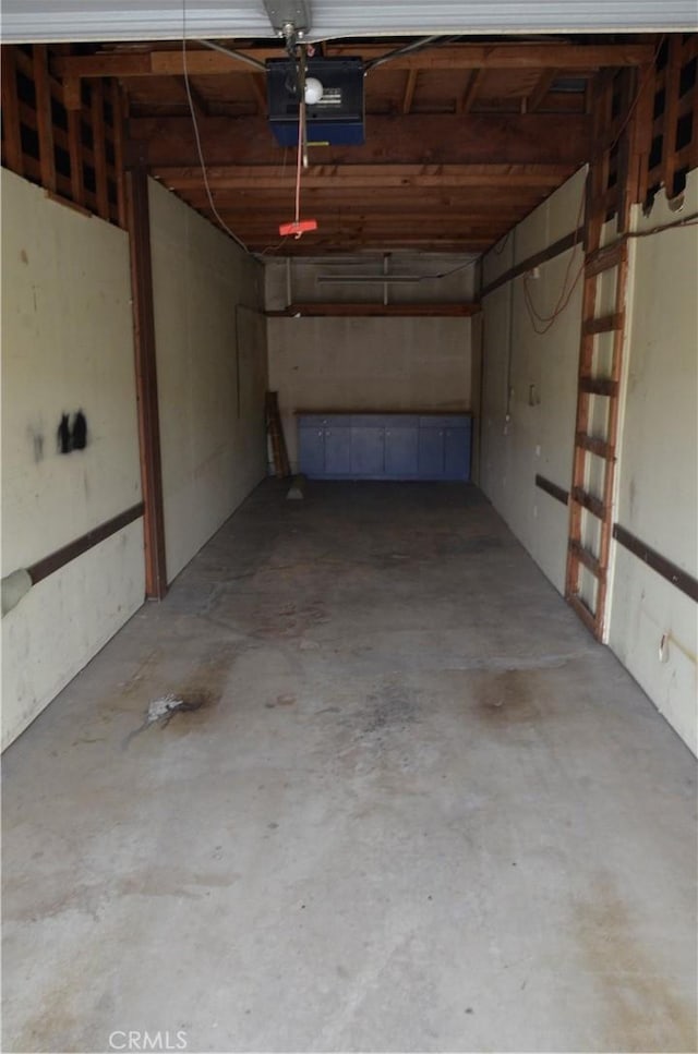 1111 S Coast Dr Unit 18, Costa Mesa, CA 92626 - garage featuring a garage door opener