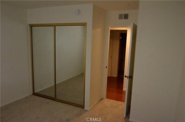 1111 S Coast Dr Unit 18, Costa Mesa, CA 92626 - unfurnished bedroom featuring carpet flooring and a closet