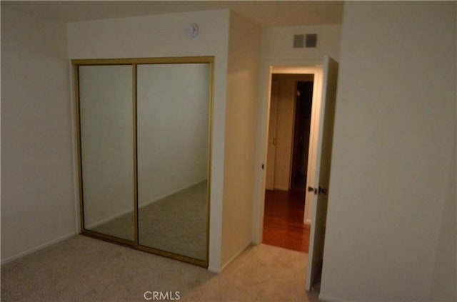 1111 S Coast Dr Unit 18, Costa Mesa, CA 92626 - unfurnished bedroom featuring carpet flooring and a closet