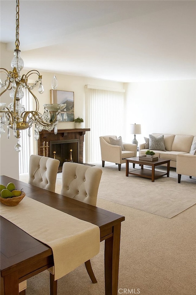 1111 S Coast Dr Unit 18, Costa Mesa, CA 92626 - dining space featuring carpet and a chandelier